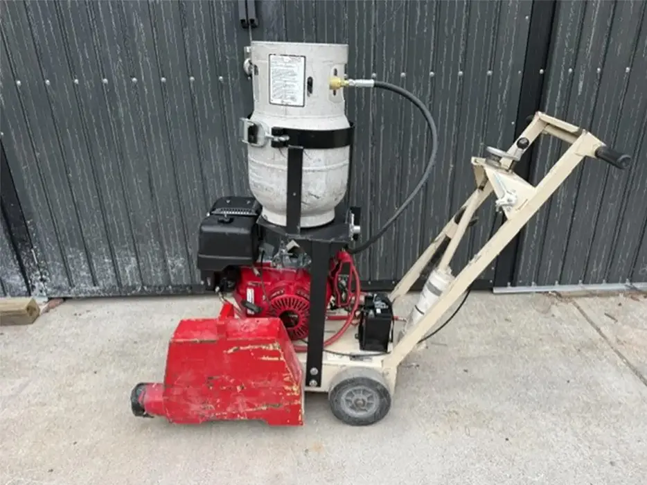 Concrete surface preparation machine after propane conversion
