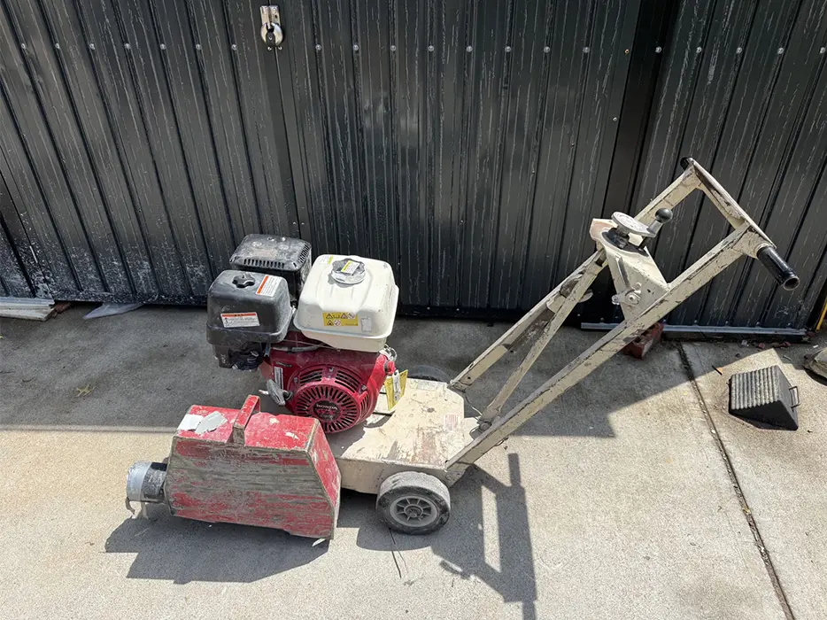 Concrete surface preparation machine before propane conversion